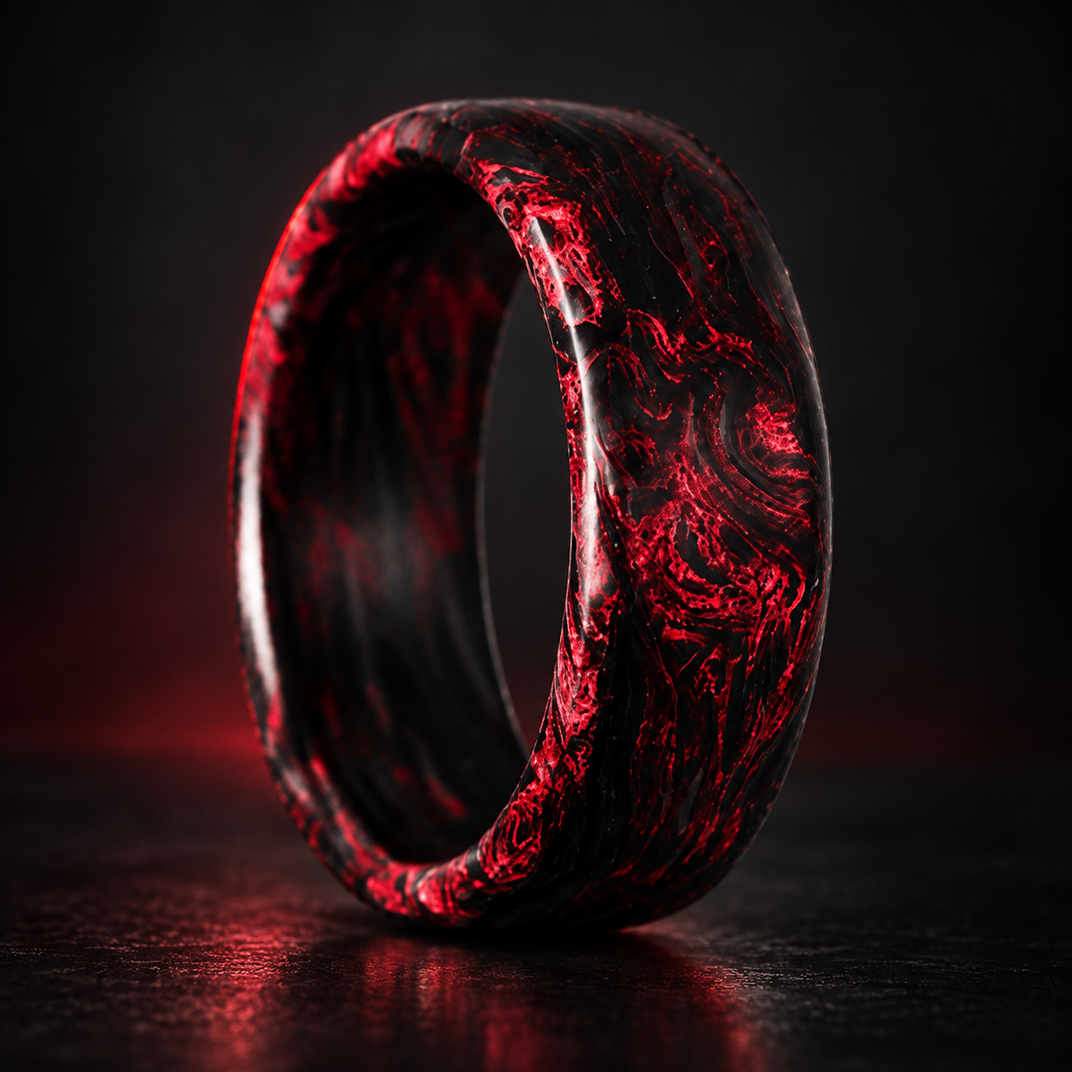 Carbon Storm Redline forged carbon fiber ring on a dark studio background