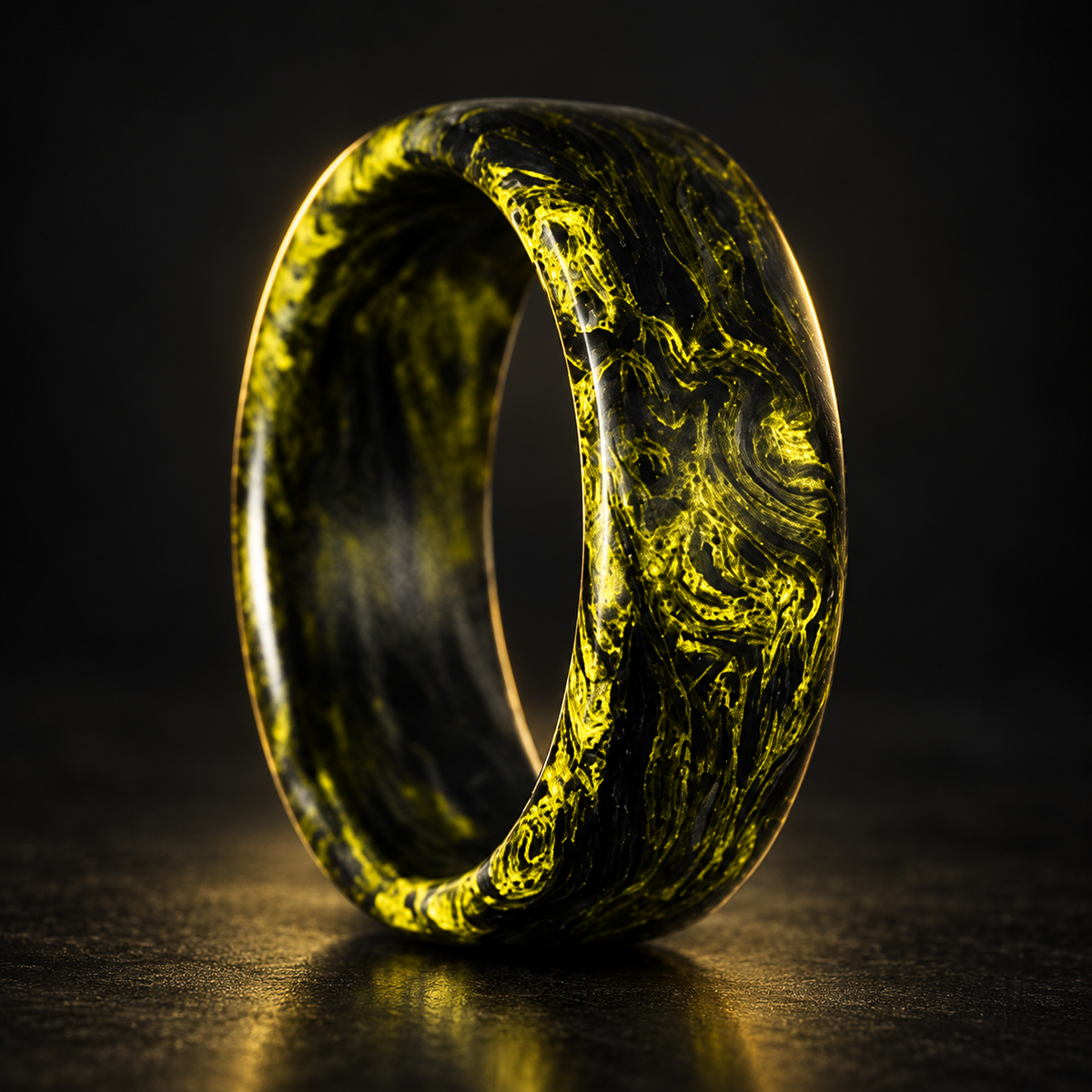 Carbon Storm Volt forged carbon fiber ring on a dark studio background