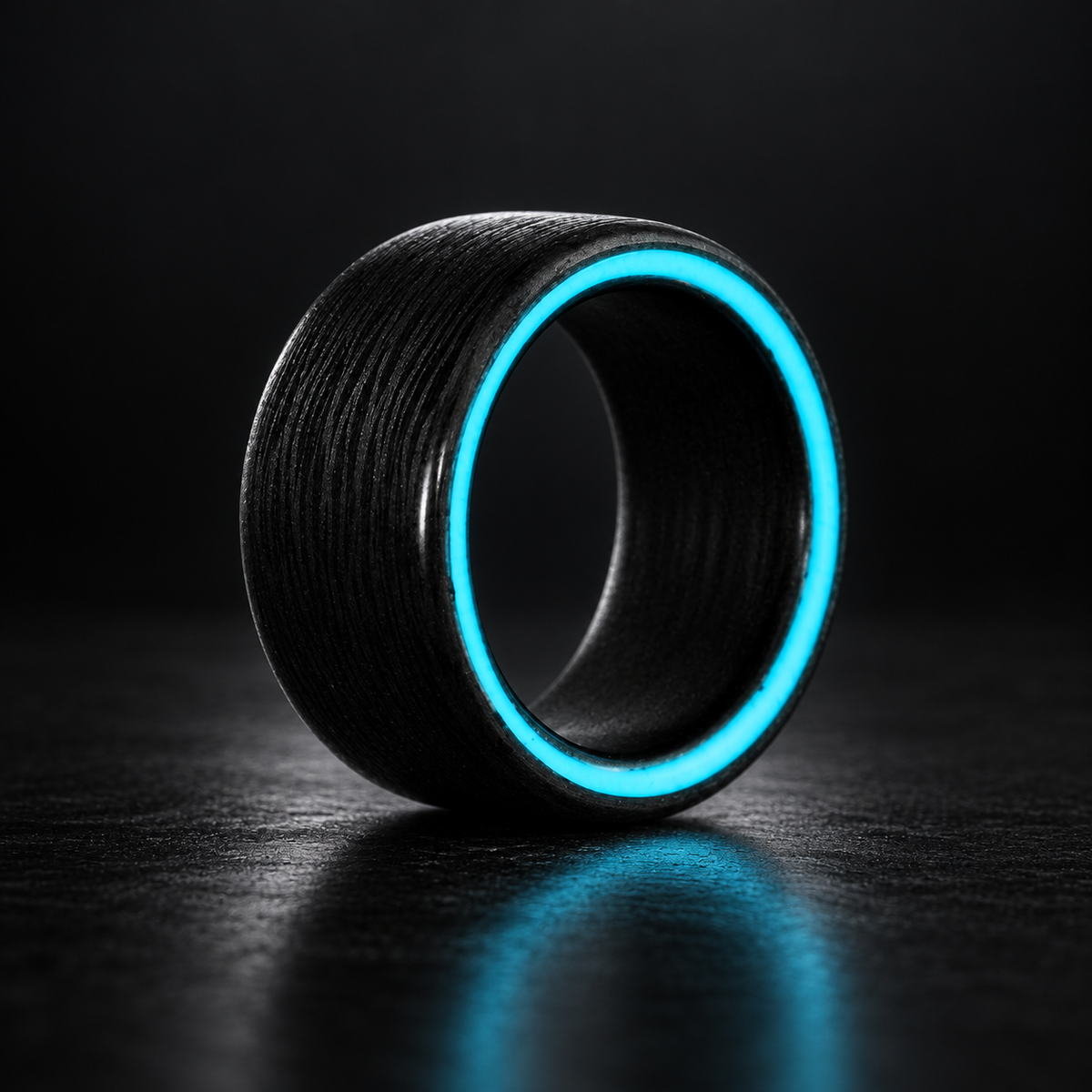 Oreo carbon fiber side glow ring on a dark studio background